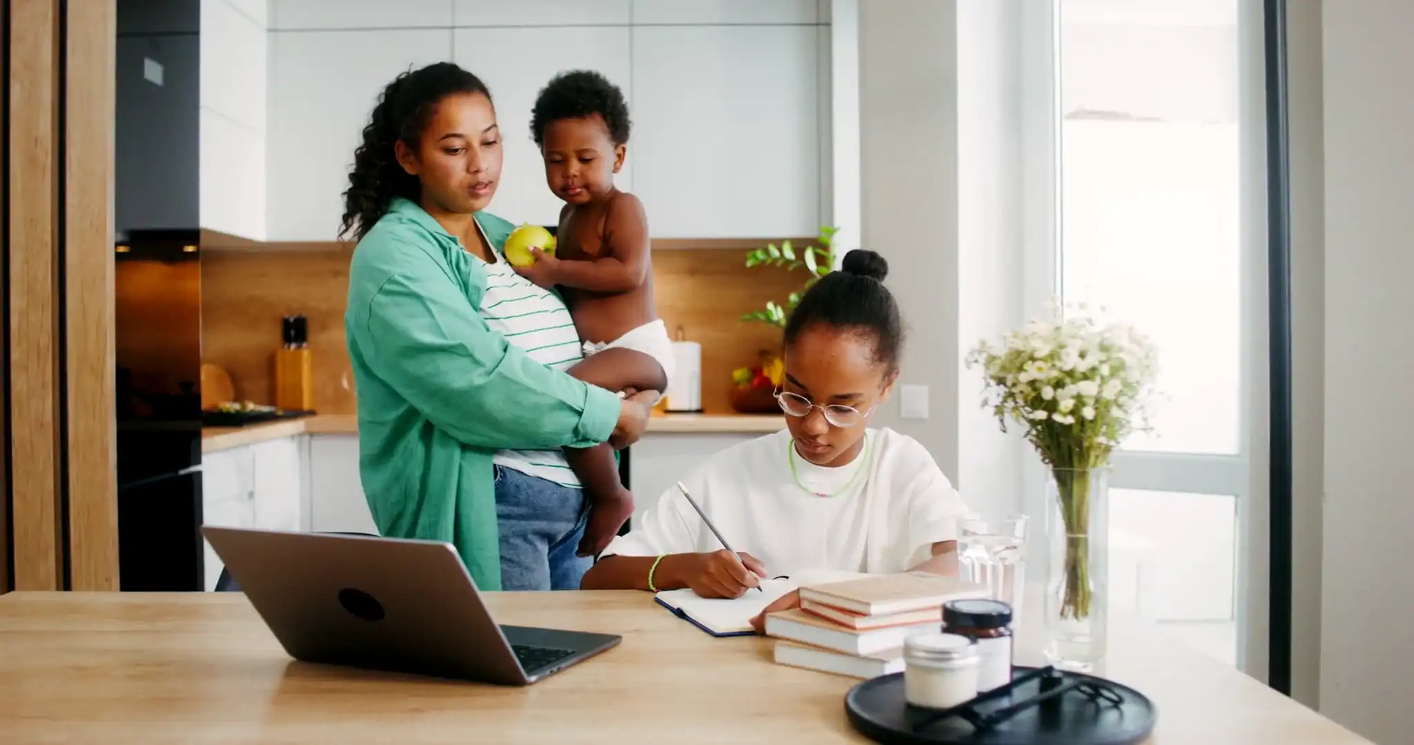 Teacher helping a student with homeschooling in a classroom setting
